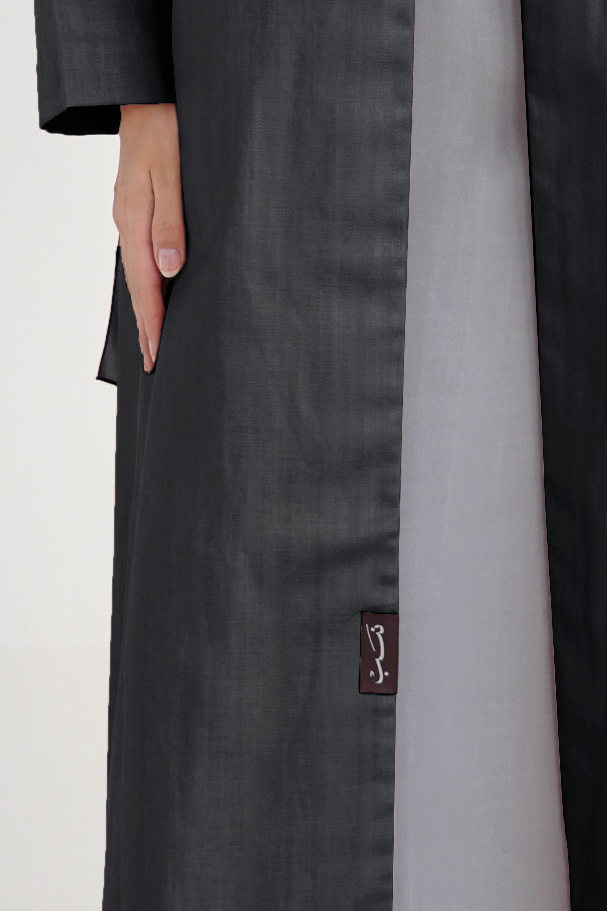 Whimsy Black abaya NASAB label detail