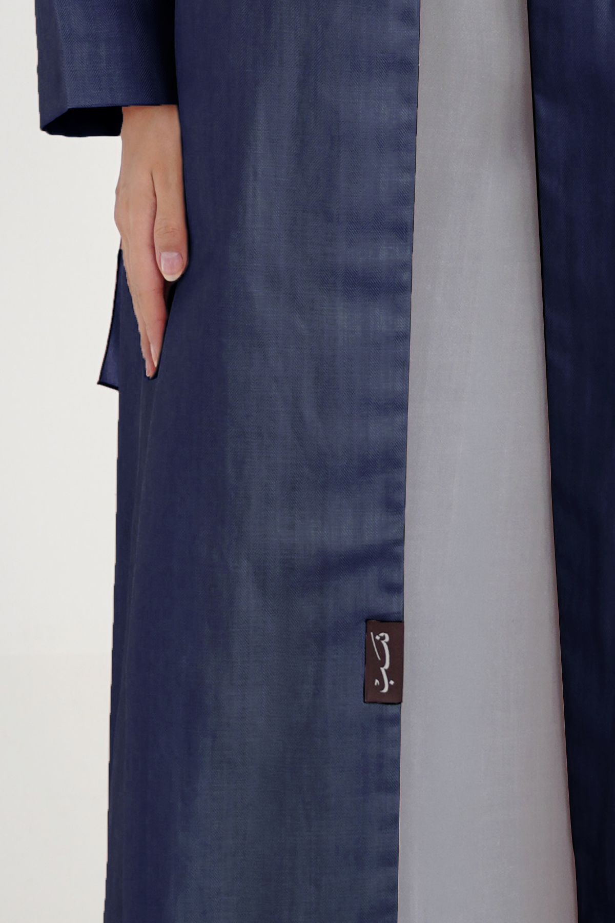 Whimsy Navy Blue abaya NASAB label detail